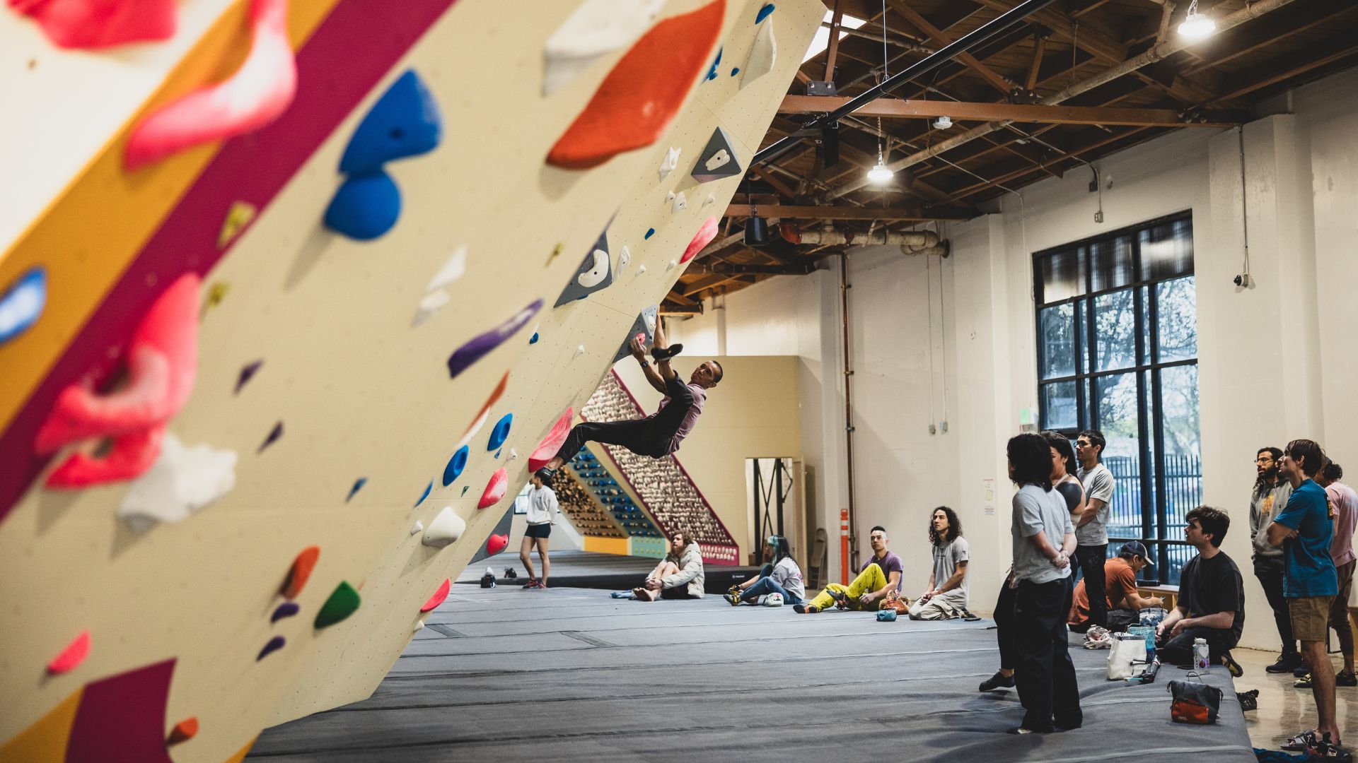 Climbers bouldering at the new gym