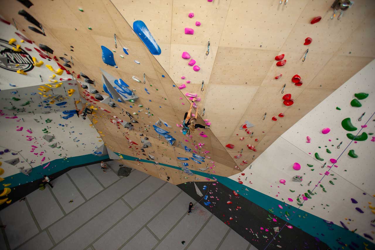 Climbers ascend the Walltopia-built rope walls at High Point Orlando