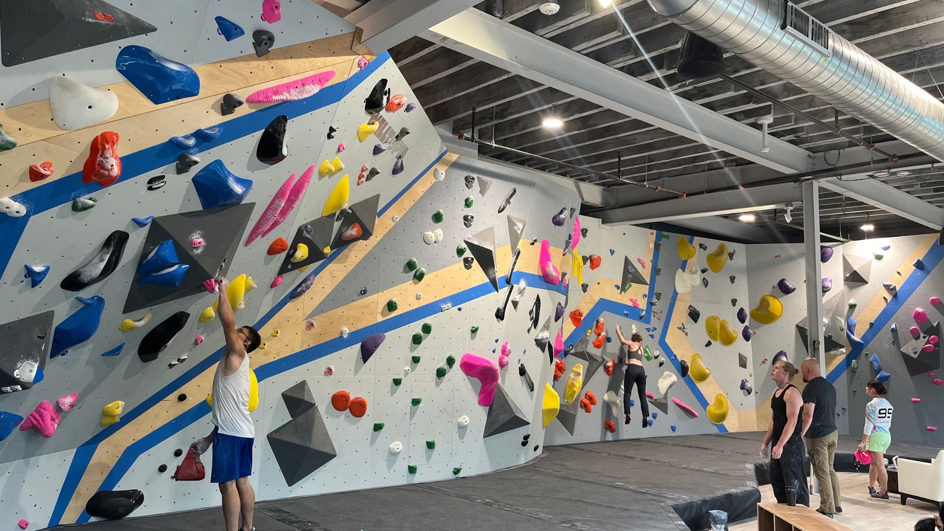 Climbers bouldering at the new CRG Troy location