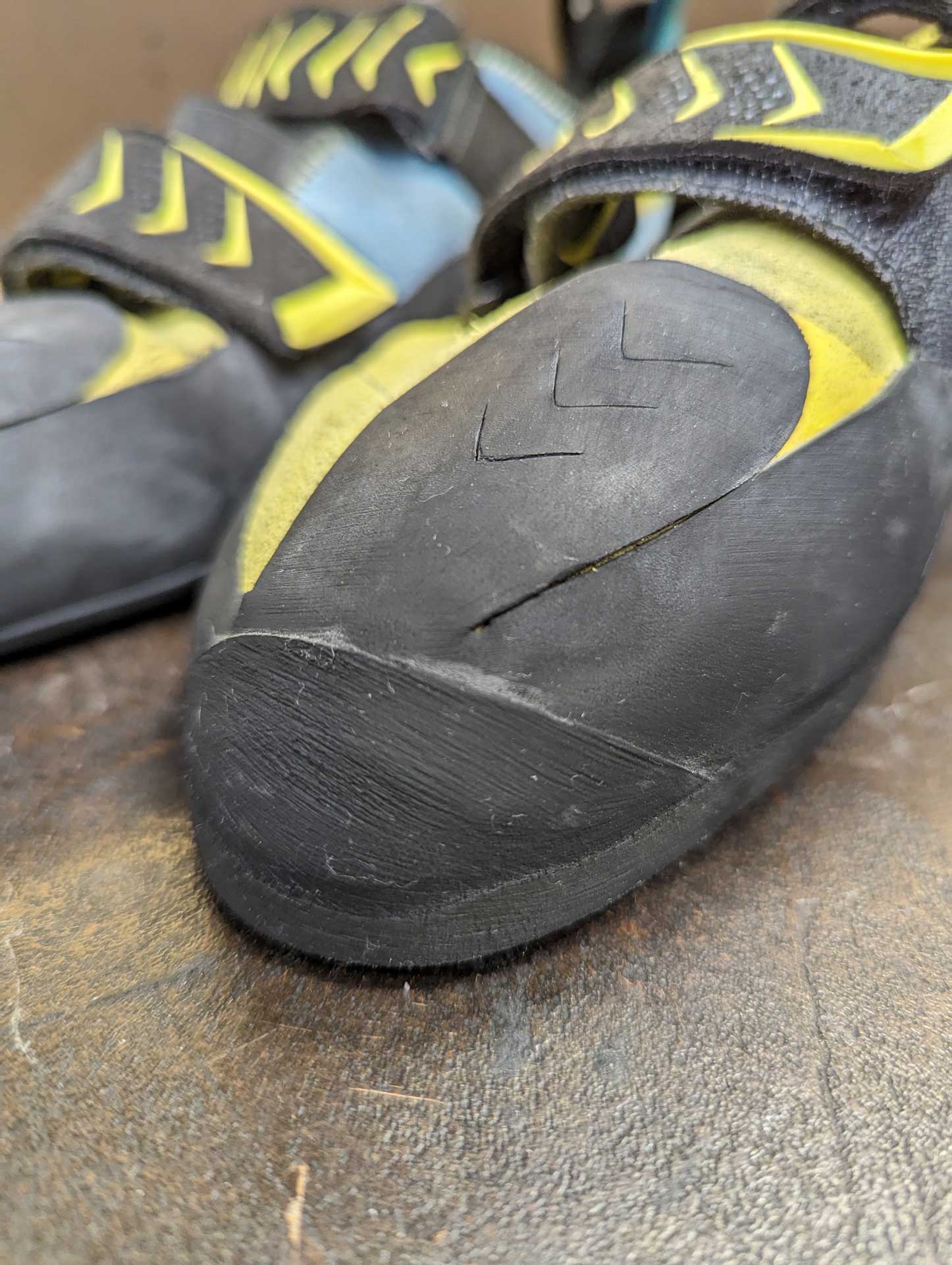 A fresh piece of high-performance rubber applied to a climbing shoe after a professional resole