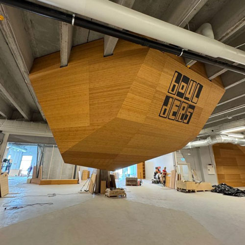indoor climbing boulder hanging from ceiling