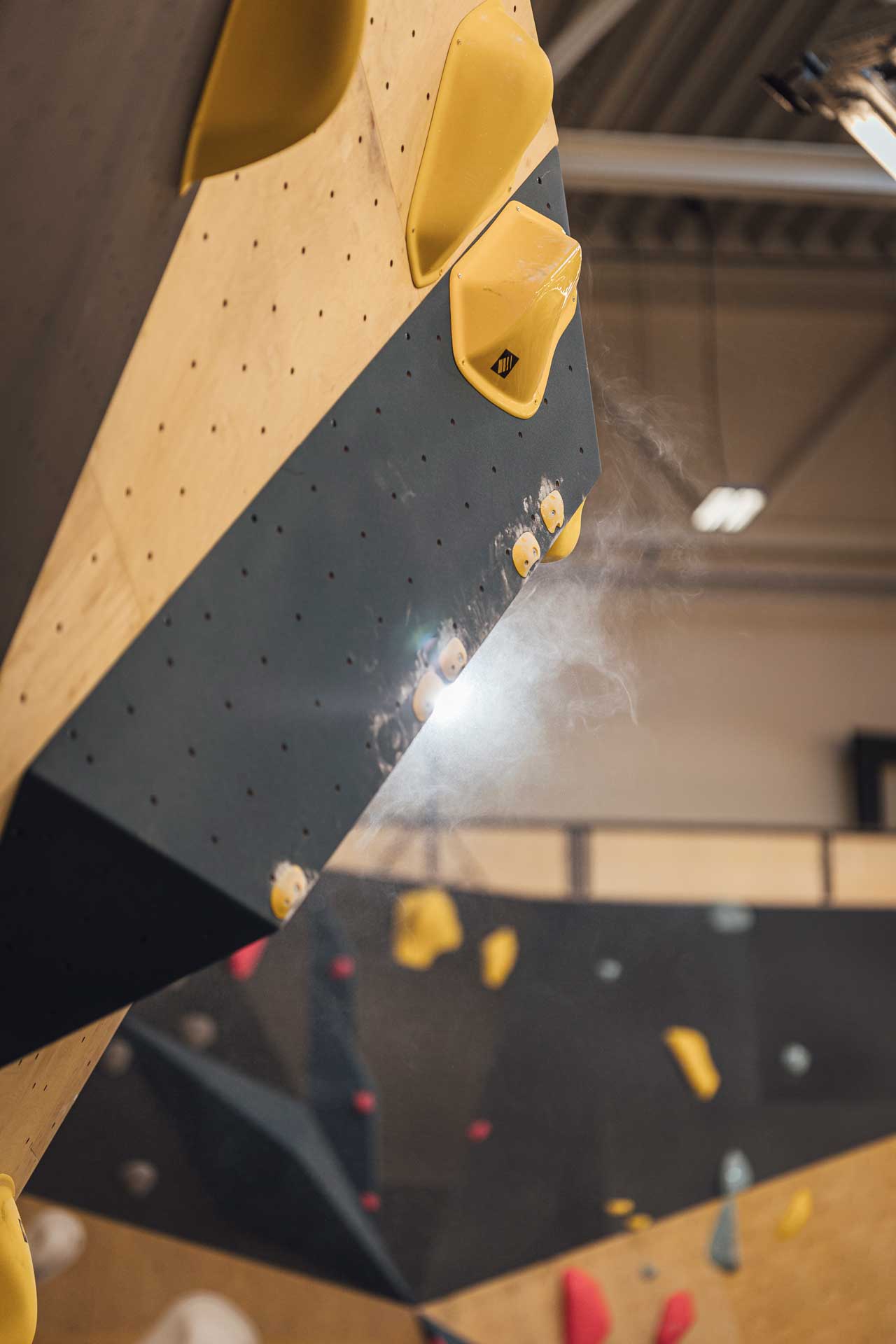 Chalked-up Chapter holds on a bouldering wall