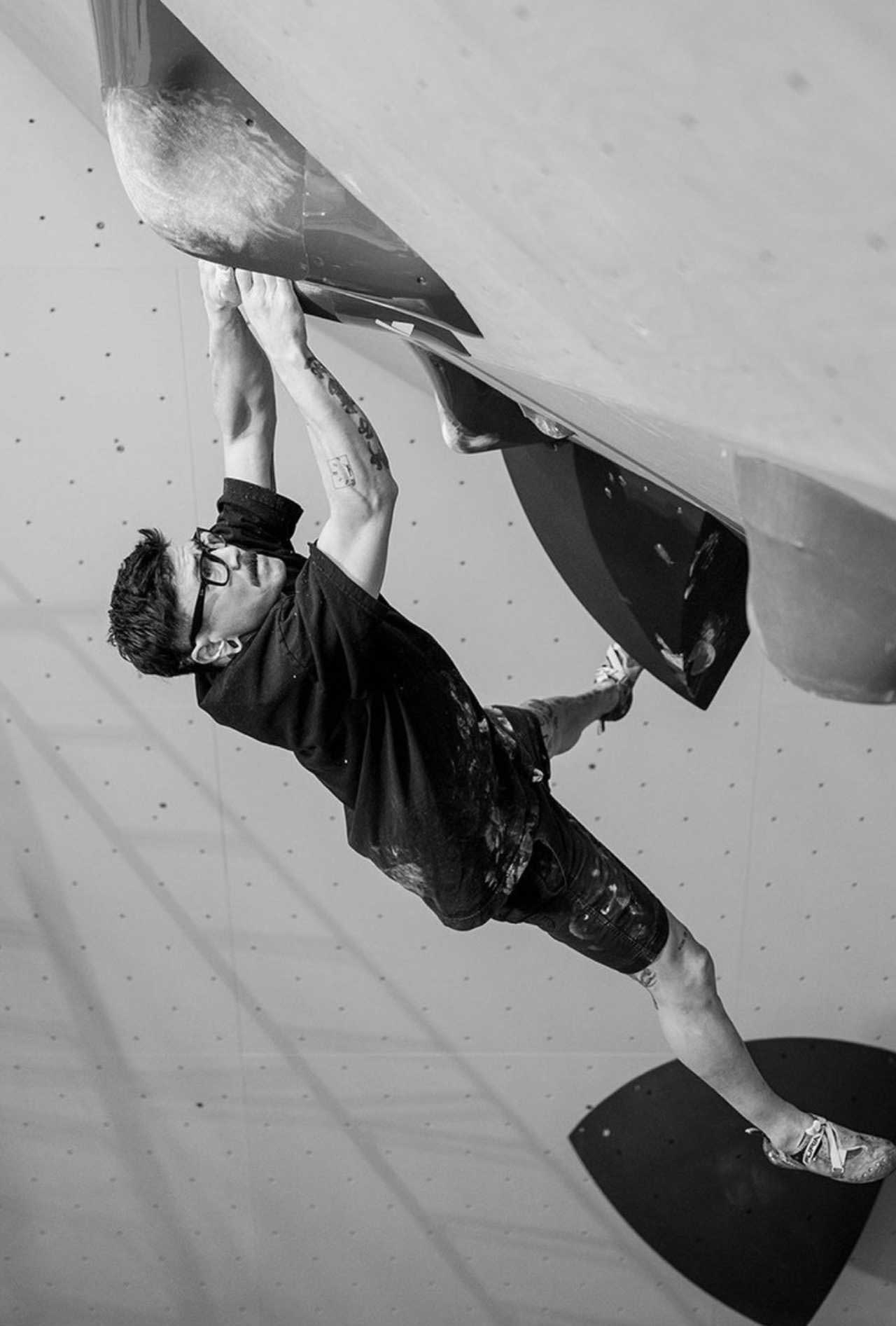 Jeremy forerunning a bouldering problem