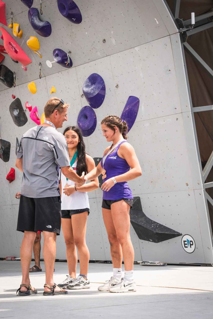 Marc Norman congratulating USA Climbing athletes