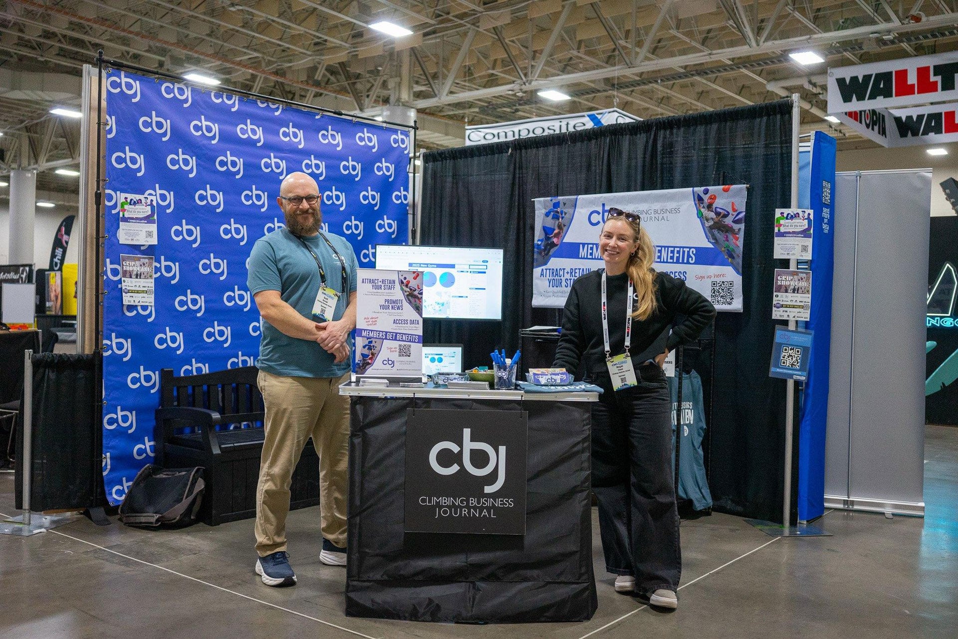 Scott Rennak at Megan Cheek at the CBJ booth at the Summit