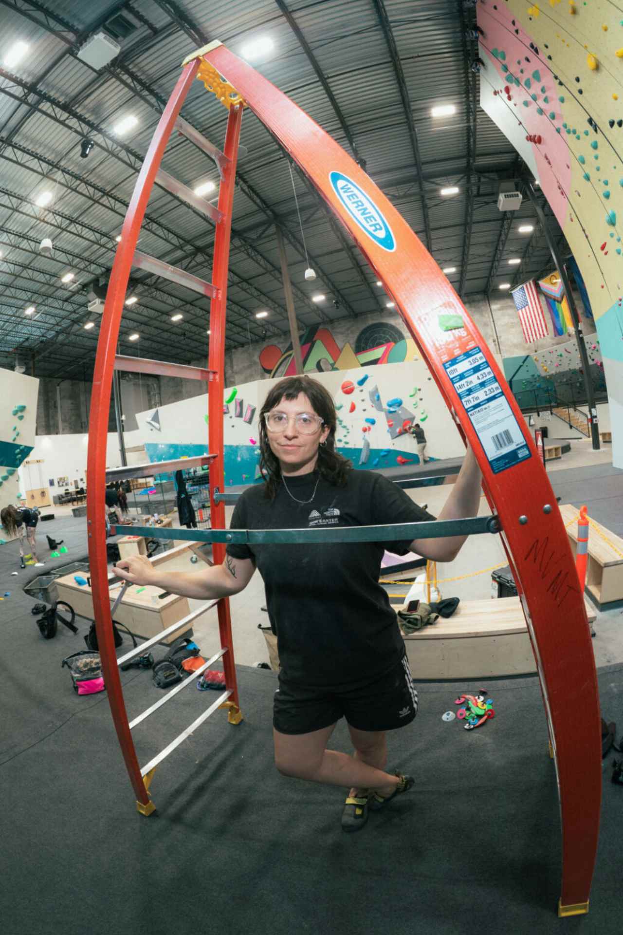 Altana posing for a setting photo under a ladder