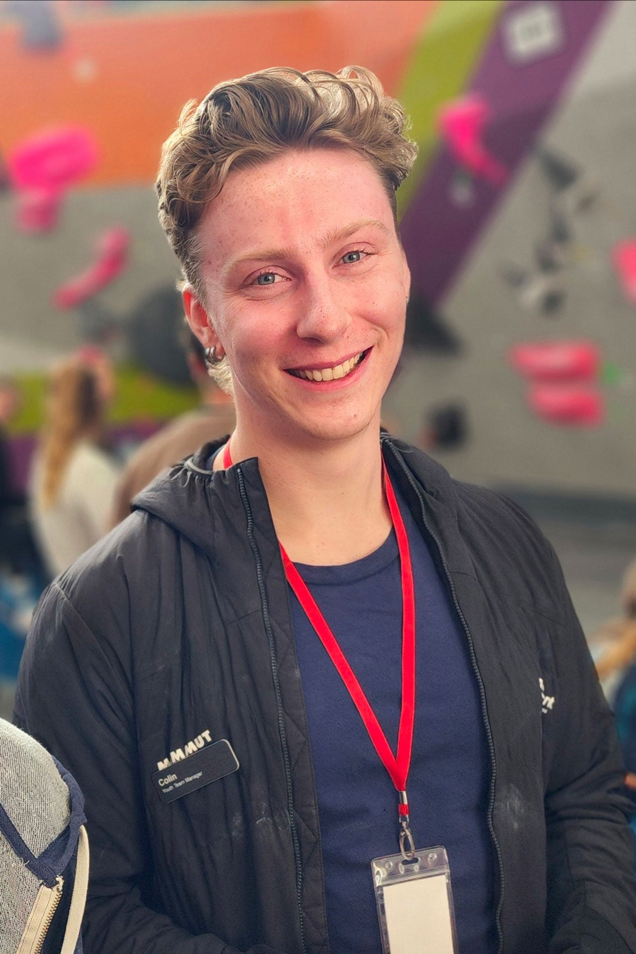 Colin Meyer coaching at an indoor climbing competition