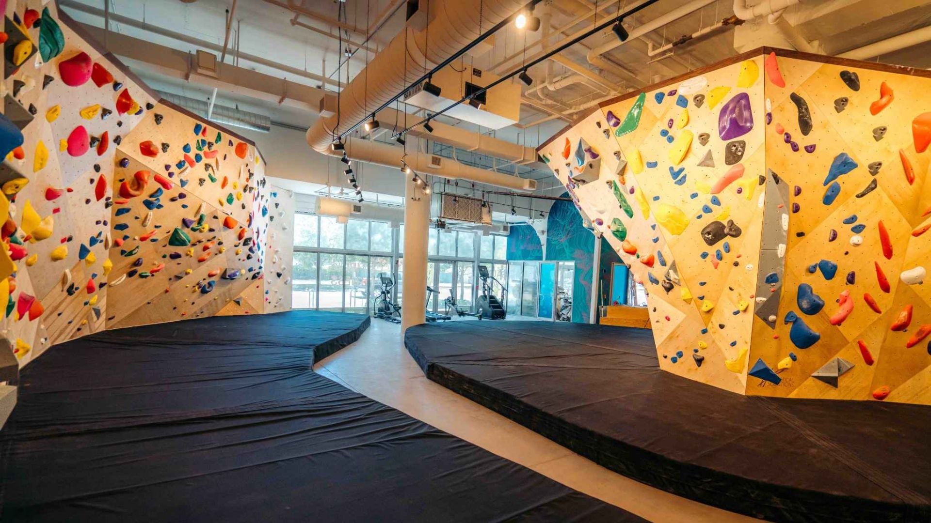 A bouldering and workout area at the new gym