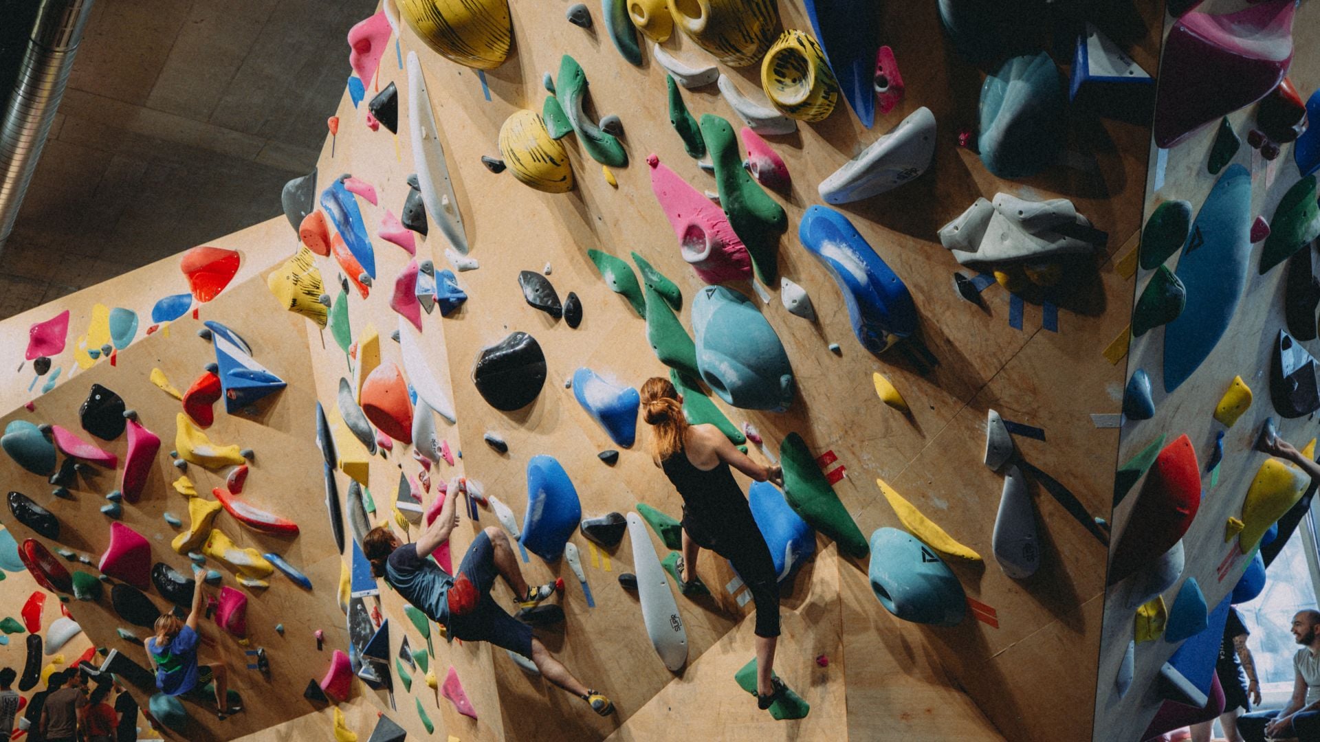 Climbers bouldering at Mitō Bouldering