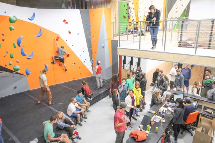 Climbers hanging out by a desk area