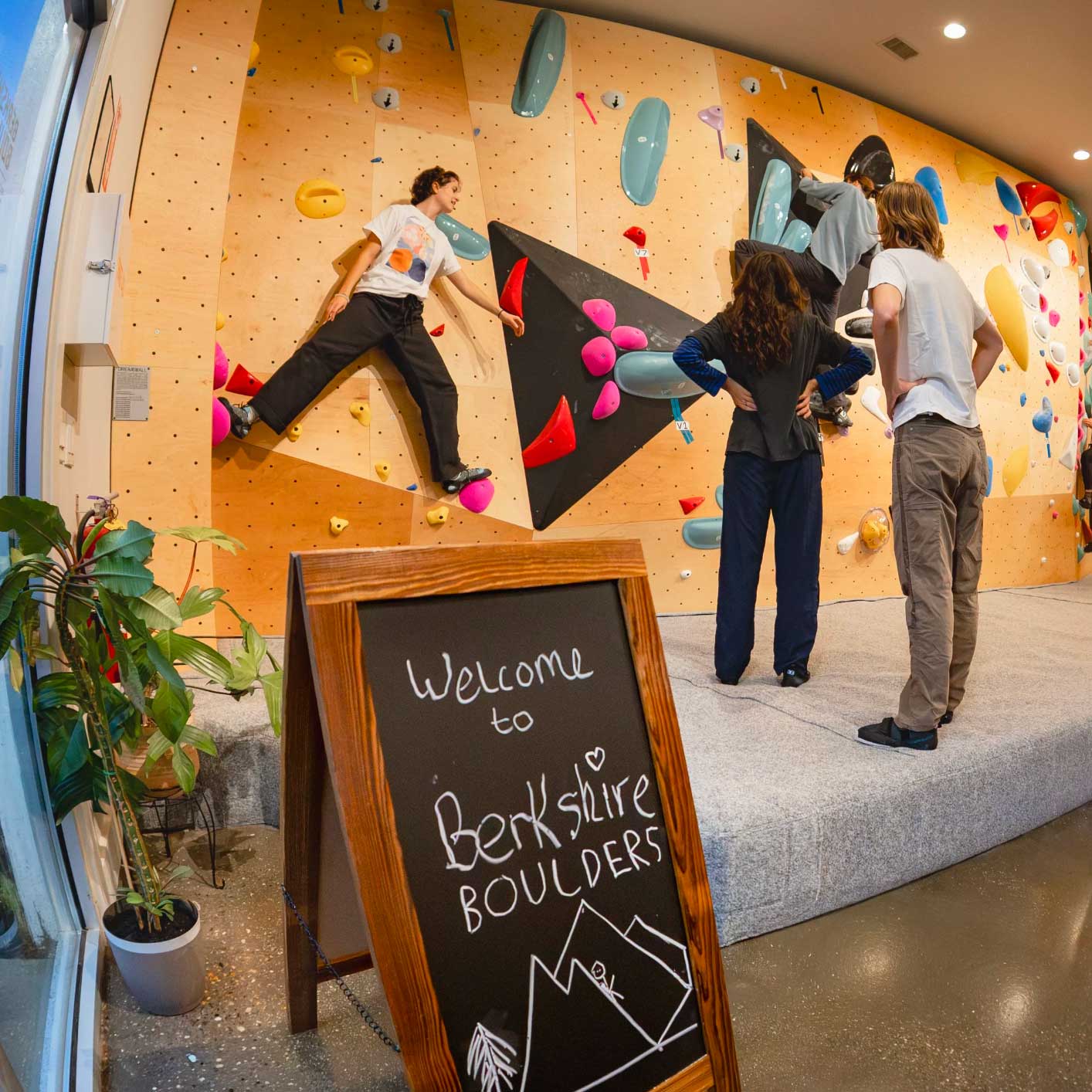 Climbers bouldering at the new gym