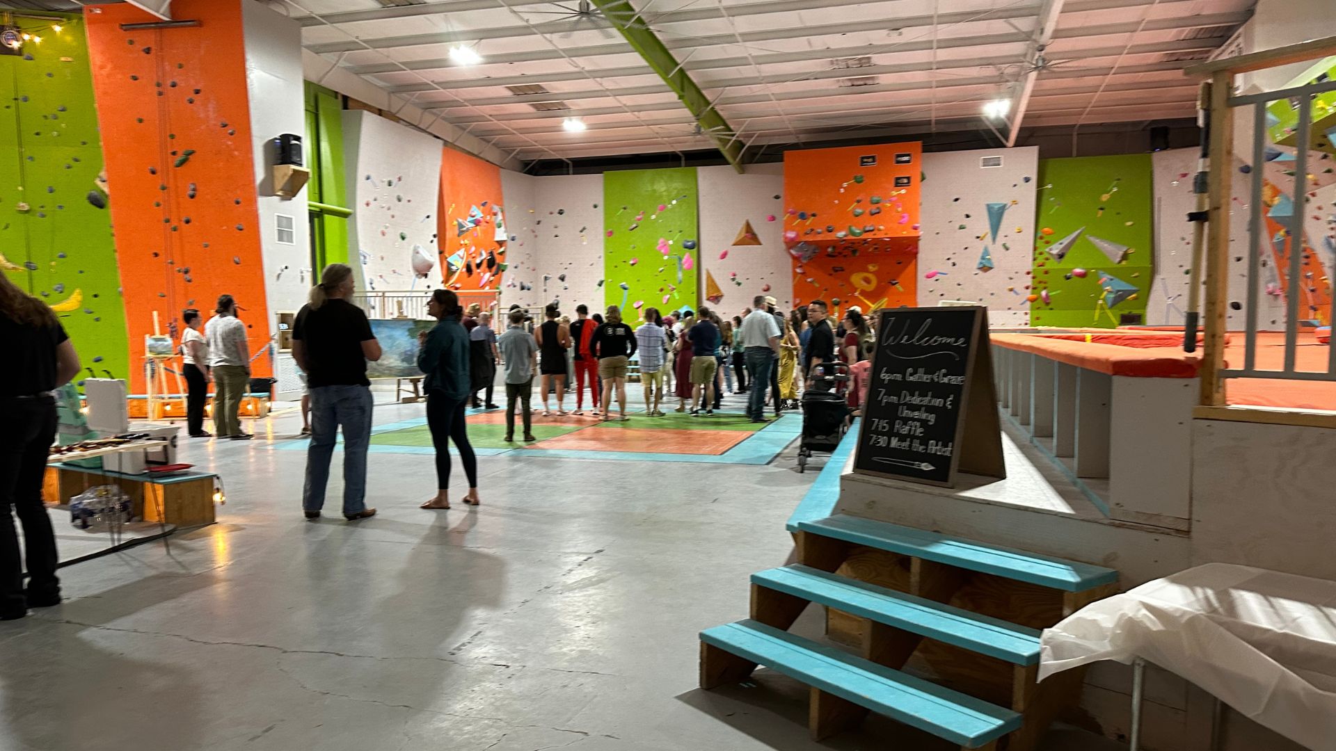 A small crowd gathers inside Active Climbing Augusta