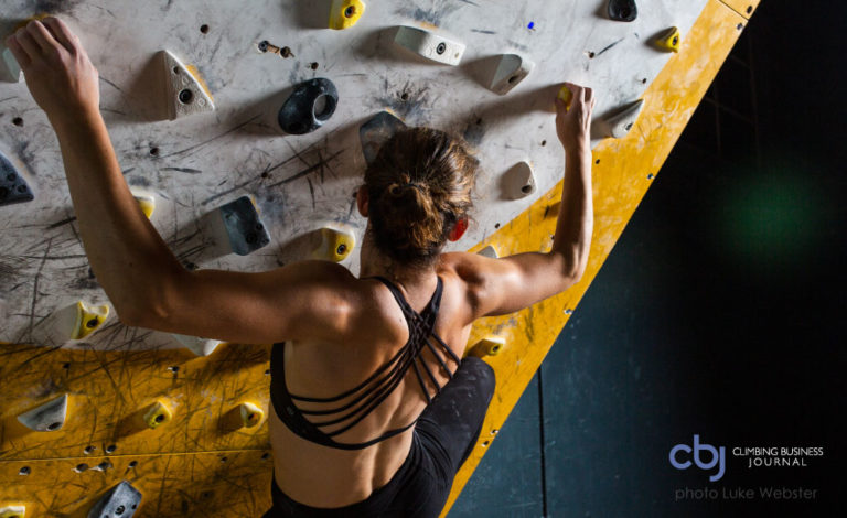 woman climbing on a training board