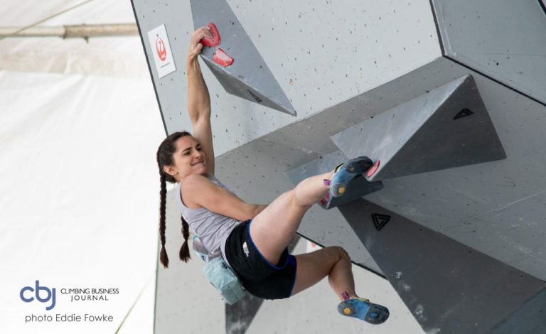 Kyra Condie bouldering in competition