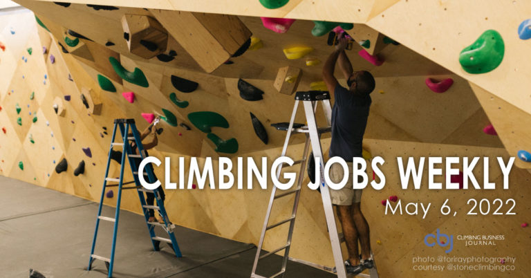 routesetters in a climbing gym