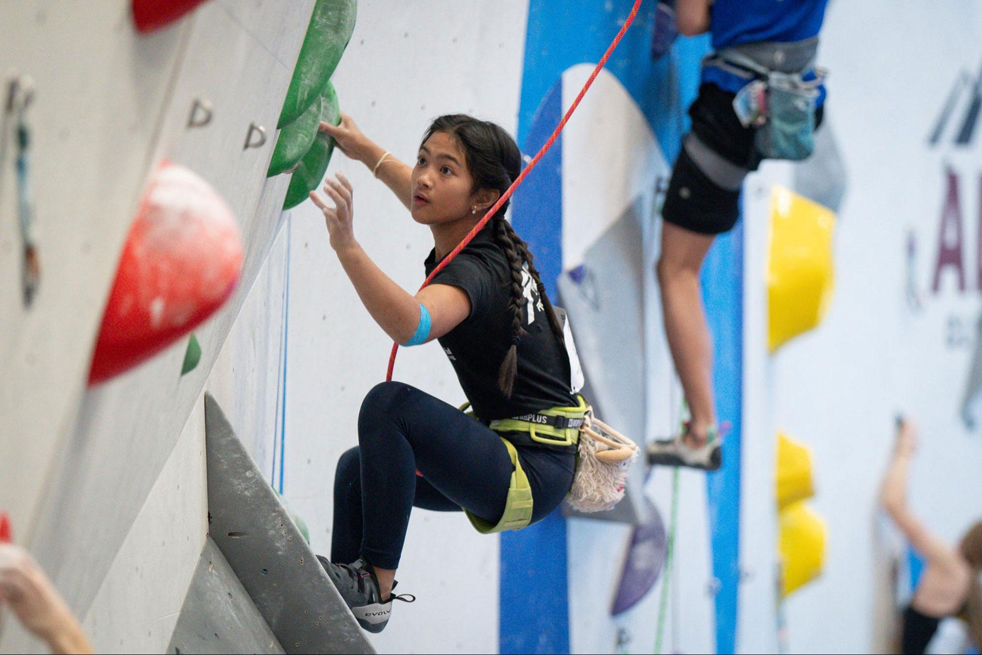 A youth climber on a top rope route